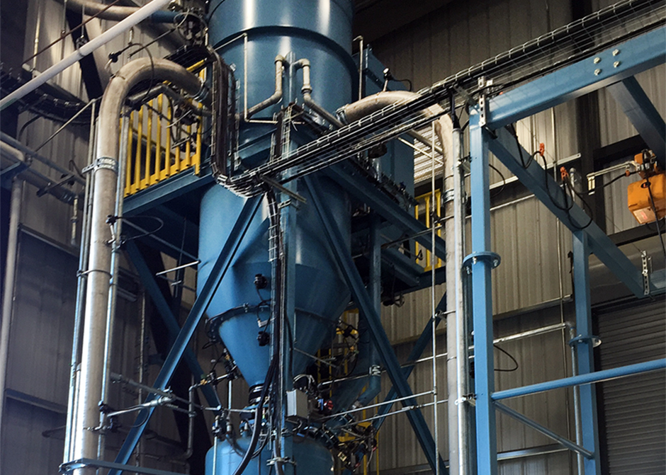 High density vacuum unloading of carbon black from railcars to storage silos