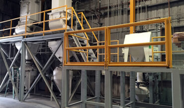 BagBuster™ bag breaking of tile grout with dense phase pneumatic conveying to Bella mixers